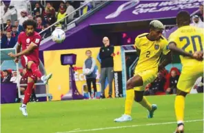  ?? Shaji Kayamkulam ?? Qatar’s Akram Afif drills a shot towards the Ecuador goal in the opening match of the FIFA World Cup Qatar 2022 at Al Bayt Stadium yesterday. PICTURES: