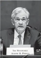  ?? DREW ANGERER/GETTY ?? Federal Reserve Board Chairman Jerome Powell notes that economic recovery has slowed in recent months.