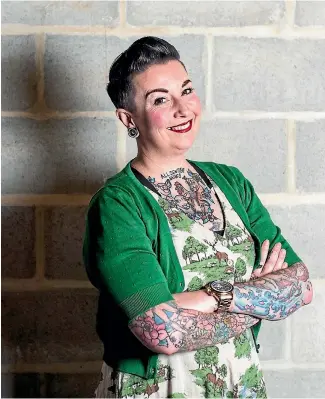  ?? PHOTO: FAIRFAX ?? Polly McGee works for a tech company and says her tattoos tend to disarm people.