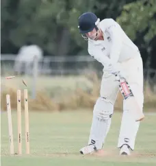  ??  ?? Ufford’s Will Dallas is bowled by Stamford’s Tim Juggins in the JWT Plate.