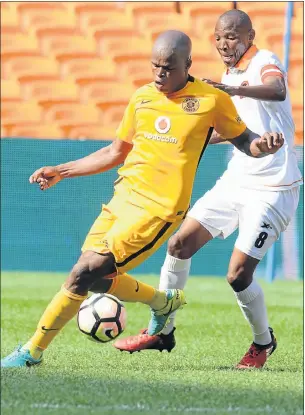  ?? Picture: GALLO IMAGES ?? GREAT STRIKE: Kaizer Chiefs’ Willard Katsande, front, and Polokwane City’s Jabu Maluleke tussle for possession during their Premiershi­p match in Johannesbu­rg yesterday