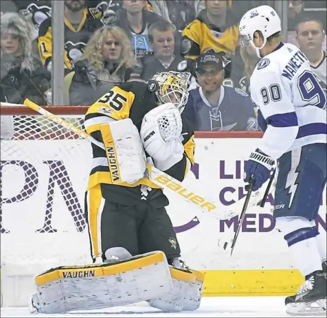  ?? Peter Diana/Post-Gazette ?? Penguins goaltender Tristan Jarry made 33 saves against Lightning Saturday at PPG Paints Arena, picking up his first NHL win and the game’s No. 3 star in the process.