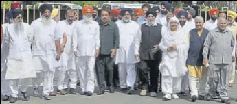  ?? RAVI KUMAR/HT ?? Shiromani Akali Dal leaders, led by party chief Sukhbir Singh Badal, coming out of the Punjab Raj Bhawan after submitting a memorandum to governor on Tuesday.