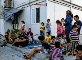  ?? MAURICIO LIMA / NEW YORK TIMES ?? A camp in southern Turkey holds Syrian refugees in August. Turkish President Recep Tayyip Erdogan, whose country hosts 3.6 million Syrian refugees, has increased his demands in recent months for a “safe zone” to resettle refugees along the Turkish border.