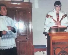  ??  ?? Fr John Dunne celebratin­g his first Mass in Sraharla church, assisted by the late Fr John Murphy, then curate in Kildorrery.