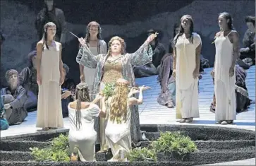  ?? Lawrence K. Ho
Los Angeles Times ?? ANGELA MEADE, center, as Norma, exemplifie­s the way to handle the nuance of Bellini’s melodic writing.