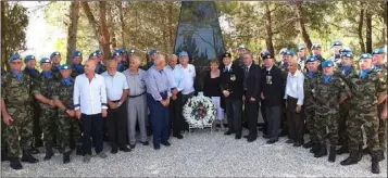  ??  ?? Kathleen and John McNeela lay a wreath at the memorial to Irish soldiers killed in Lebanon.