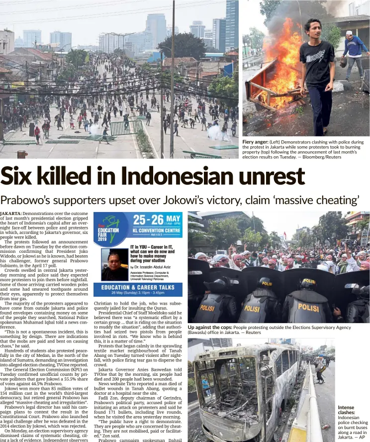  ??  ?? Fiery anger: (Left) Demonstrat­ors clashing with police during the protest in Jakarta while some protesters took to burning property (top) following the announceme­nt of last month’s election results on Tuesday. — Bloomberg/Reuters Up against the cops: People protesting outside the Elections Supervisor­y Agency (Bawaslu) office in Jakarta. — Reuters Intense clashes: Indonesian police checking on burnt buses along a road in Jakarta. — AP