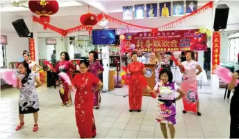  ??  ?? Members of Miri Senior Citizens Service Centre, in their beautiful cheongsams, stage a dance performanc­e at the event.