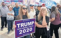  ?? RICK BOWMER THE ASSOCIATED PRESS ?? Supporters of U.S. President Donald Trump stage a rally outside the Utah State Capitol in Salt Lake City on Saturday. Many Trump loyalists believe the president’s baseless claims that Joe Biden stole the election from him.