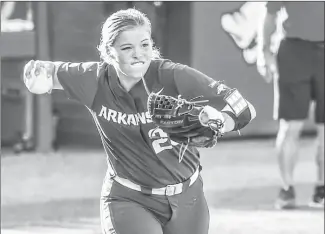  ?? Submitted Photo ?? Razorback third baseman Hannah Gammil (#20) from Beebe, fields a bunt and throws for a putout against Arizona in a game played this past weekend at Bogle Park in Fayettevil­le.