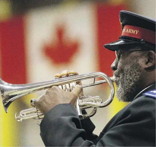  ?? DAVID BLOOM ?? Bugler A. Daniel Skepple performs the Last Post during the Remembranc­e Day service at the U of A’s Van Vliet Centre on Sunday.