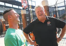  ?? Courtesy Baltimore Orioles ?? The A’s Boog Powell (left) seems to be enjoying himself as he meets former Baltimore first baseman Boog Powell, the 1970 American League MVP, at Camden Yards.