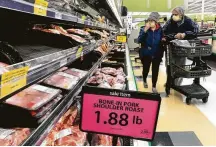  ?? Mark Hoffman / Associated Press ?? President Donald Trump declared meat processing plants critical infrastruc­ture to secure the nation’s meat supply.