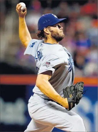  ?? Mike Stobe Getty Images ?? CLAYTON KERSHAW, throwing a pitch in the first inning, dominated the Mets, giving up only one run and three hits in seven innings. He ended a five-start losing streak in the postseason.