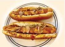  ?? ?? HOT DOG BASICS
Should a hot dog have ketchup? No, say many purists. A slice of pickle? Sometimes. Cheese? Only if it is described as a Cheese Dog
