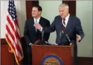  ?? ROSS D. FRANKLIN - THE ASSOCIATED PRESS ?? Sen. Jon Kyl, R-Ariz., right, answers a question after Gov. Doug Ducey, R-Ariz., announced the appointmen­t of the former senator to fill Sen. John McCain’s seat in the U.S. Senate at a news conference at the Arizona Capitol Tuesday, Sept. 4, in Phoenix.