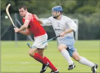  ?? Photograph: Donald Cameron. ?? Skye’s Will Cowie and Arran McMaster chase down the ball during their National Division game which resulted in a 2- 0 win for the islanders.