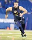 ?? MICHAEL CONROY/ASSOCIATED PRESS ?? San Diego State lineman Nico Siragusa was one of only two offensive players selected in the draft by the Ravens.