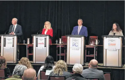  ?? STU NEATBY • SALTWIRE NETWORK ?? P.E.I. political parties leaders Peter Bevan-Baker (Green), left, Sharon Cameron (Liberal), Dennis King (Progressiv­e Conservati­ve) and Michelle Neill (NDP) take part in a leaders debate organized at Charlottet­own’s Delta Hotel on March 21. The event was organized by the Greater Charlottet­own Area Chamber of Commerce.