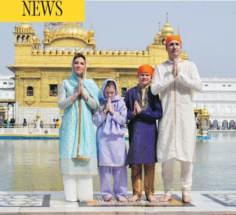  ?? PUBLIC RELATIONS OFFICE, GOVERNMENT OF PUNJAB VIA AP ?? Prime Minister Justin Trudeau, his wife, Sophie Grégoire Trudeau, their daughter Ella-Grace and son Xavier offer an Indian-style greeting during their visit to the Golden Temple in Amritsar, India, last week.