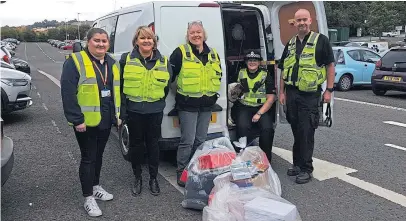  ??  ?? Police and Trading Standards officers took part in the operation at Errol Sunday Market.