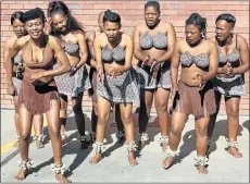  ??  ?? SMART MOVES: North West offenders perform a Tswana dance at the festival