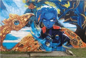  ?? | PHOTO : OUEST-FRANCE ?? Les fresques ont un point commun ? Elles sont toutes en bleu. Toutes, avec l’appel de la mer.
