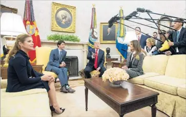 ?? Pool photo/Getty Images ?? SOPHIE TRUDEAU, left, and her husband, Canadian Prime Minister Justin Trudeau, meet with President Trump and Melania Trump at the White House while talks among the U.S., Canada and Mexico take place.