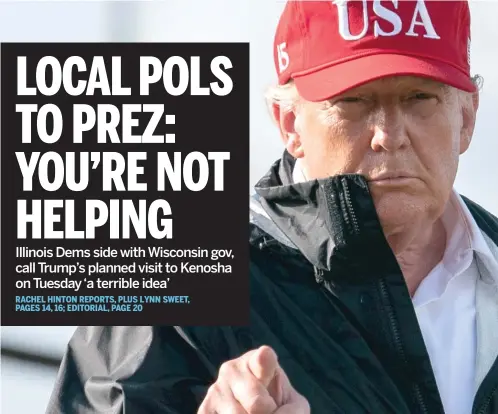  ?? AP ?? President Donald Trump points Saturday while walking to Air Force One to depart Lake Charles, Louisiana, where he surveyed damage from Hurricane Laura.