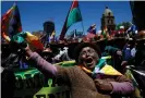  ??  ?? A supporter of President Evo Morales shows her support during a march in La Paz, Bolivia, on Wednesday. Photograph: Juan Karita/AP