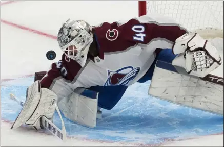  ?? LINDSEY WASSON — THE ASSOCIATED PRESS ?? Avalanche goaltender Alexandar Georgiev makes a stop against the Seattle Kraken during the first period Tuesday in Seattle.