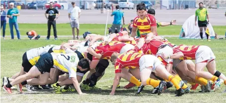  ?? COURTESY OF MO PETKOV ?? The Santa Fe Santos and Tucson Magpies settle into a forward pack in a scrum during last Saturday’s game in Albuquerqu­e. Los Santos are in the sweet 16 of amateur rugby and will face Beaumont, Calif., in neutral Tucson on Saturday.