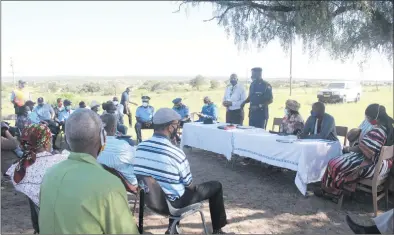  ?? Photos: Emmency Nuukala ?? Serious talks… Khomas police commander Commission­er Joseph Shikongo addressing the community with chief of the /Khomanin Traditiona­l Authority Juliana Gawanas next to him.