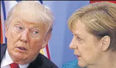  ?? REUTERS ?? Donald Trump and Angela Merkel in Hamburg in July 2017.
