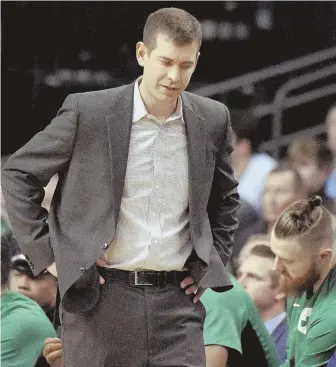  ?? HERALD PHOTO BY JIM MICHAUD ?? PUZZLING: Celtics coach Brad Stevens is still trying to figure out how to put his lineup together thanks to myriad injuries.