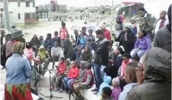  ??  ?? JAMMING ALONG: Crowds are entertaine­d by local artists at the launch of the Ujamma communal garden amphitheat­re in Khayelitsh­a.