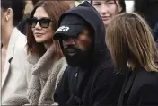  ?? JULIEN DE ROSA — GETTY IMAGES ?? Kanye West attends the Givenchy Spring-Summer 2023 fashion show during the Paris Womenswear Fashion Week, in Paris.