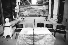  ??  ?? A bust of Cuban independen­ce hero Jose Marti (left) and an image of late Cuban President Fidel Castro is seen on a street ahead of the nomination­s for candidates for municipal assemblies in Havana, Cuba.The US government made it tougher for Americans...