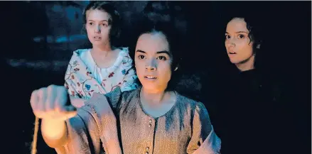  ?? NETFLIX ?? Julia Rehwald, from left, Olivia Scott Welch and Kiana Madeira in “Fear Street Part 3: 1666.”