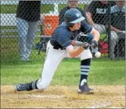  ?? GENE WALSH — DIGITAL FIRST MEDIA ?? North Pennís Ryan Bealer attempts a bunt during the Knights’ District 1-6A second round game against Boyertown on Wednesday, May 24, 2017.