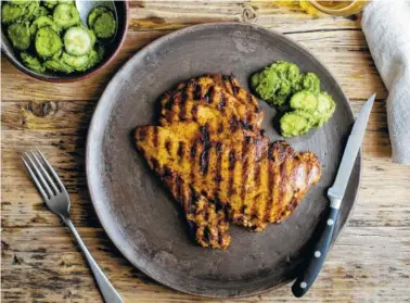  ?? PHOTOS BY ANDREW SCRIVANI/THE NEW YORK TIMES ?? Grilled Chicken Breasts With Spicy Cucumbers.