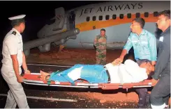  ?? PTI ?? An injured passenger is carried for treatment after a Jet Airways flight veered off the runway at Goa Airport in Dabolim on Tuesday early morning. —