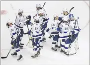  ?? PHOTOS BY JASON FRANSON — THE CANADIAN PRESS VIA AP ?? Tampa Bay Lightning players celebrate a win over the Dallas Stars in Game 3of the NHL hockey Stanley Cup Final, Wednesday, in Edmonton, Alberta.