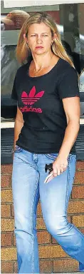  ?? Picture: Masi Losi ?? Wendy McGee walks out of the Kempton Park Magistrate’s Court on Thursday after her appeal was postponed to February 26.