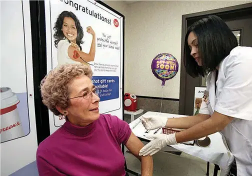  ??  ?? Walgreen has more than 26,000 pharmacist­s who administer­ed 7 million flu vaccines since September—up from 5.5 million the year before.