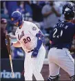  ?? Mike Stobe / Getty Images ?? The Mets’ Pete Alonso reacts after striking out with the bases loaded to end the game against the Mariners on Sunday.