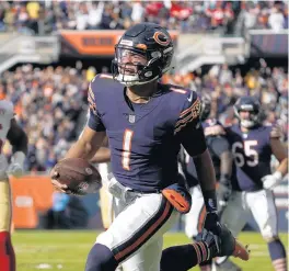  ?? DAVID BANKS/AP ?? Justin Fields runs for a touchdown against the San Francisco 49ers during the second half on Sunday.