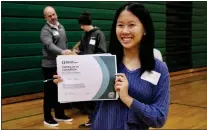  ?? COURTESY OF RIDLEY HIGH SCHOOL ?? Ridley High School student Alyssa Dang proudly holds up the certificat­e of completion that she earned at the recent Financial Reality Fair, co-hosted by Ridley High School and Franklin Mint Federal Credit Union.