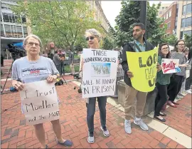  ?? MANUEL BALCE CENETA — THE ASSOCIATED PRESS ?? Linda Schierow, left, and Nancy Bundy join other protesters outside the Alexandria Federal Courthouse in Alexandria, Virginia, on the first day of Paul Manafort’s trial.